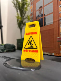 Mini “Slippery When Wet” Sign